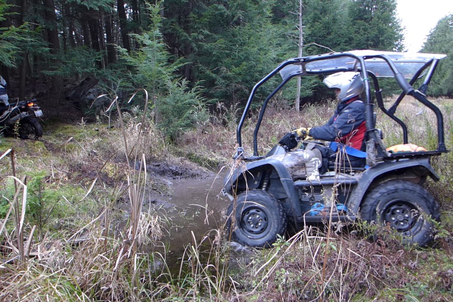 Bill on his custom rigged quad