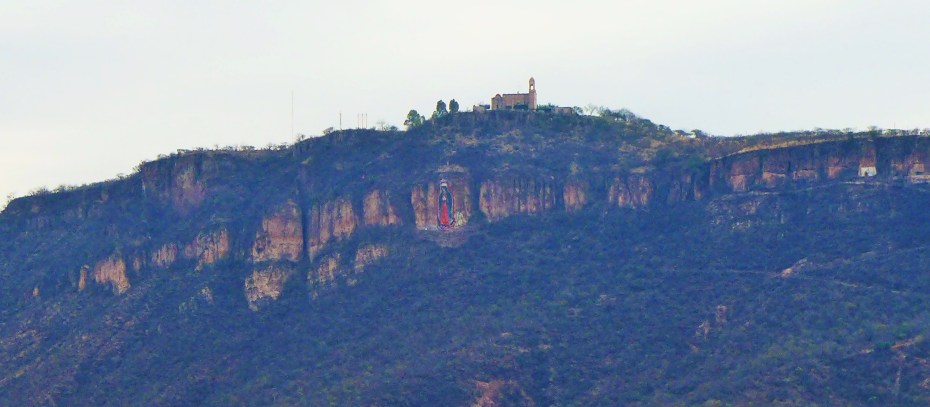 Our Lady of Guadalupe looks over the town