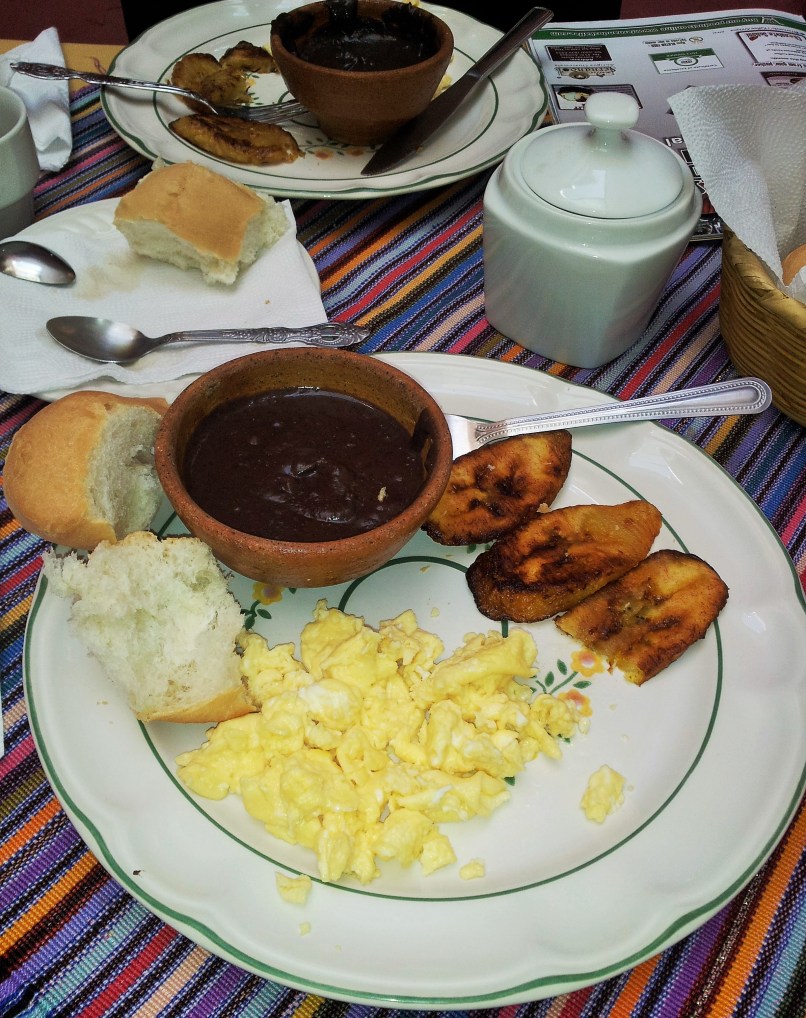 eggs, beans, fried bananas and coffee to start off the day right