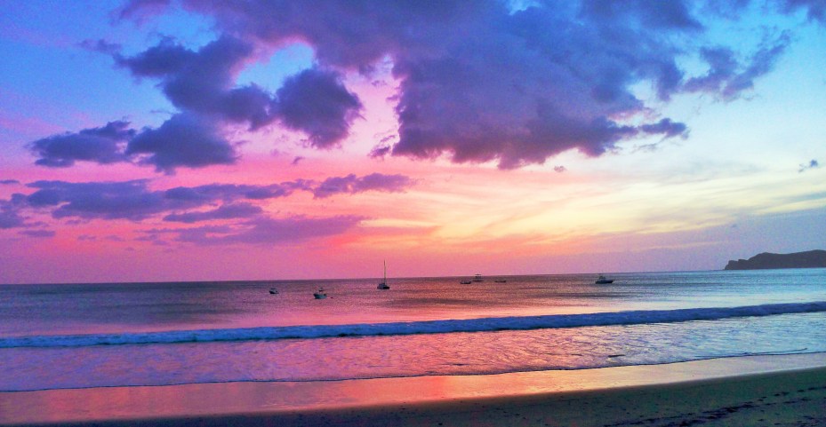 beautiful sunsets fall over the pacific coastline