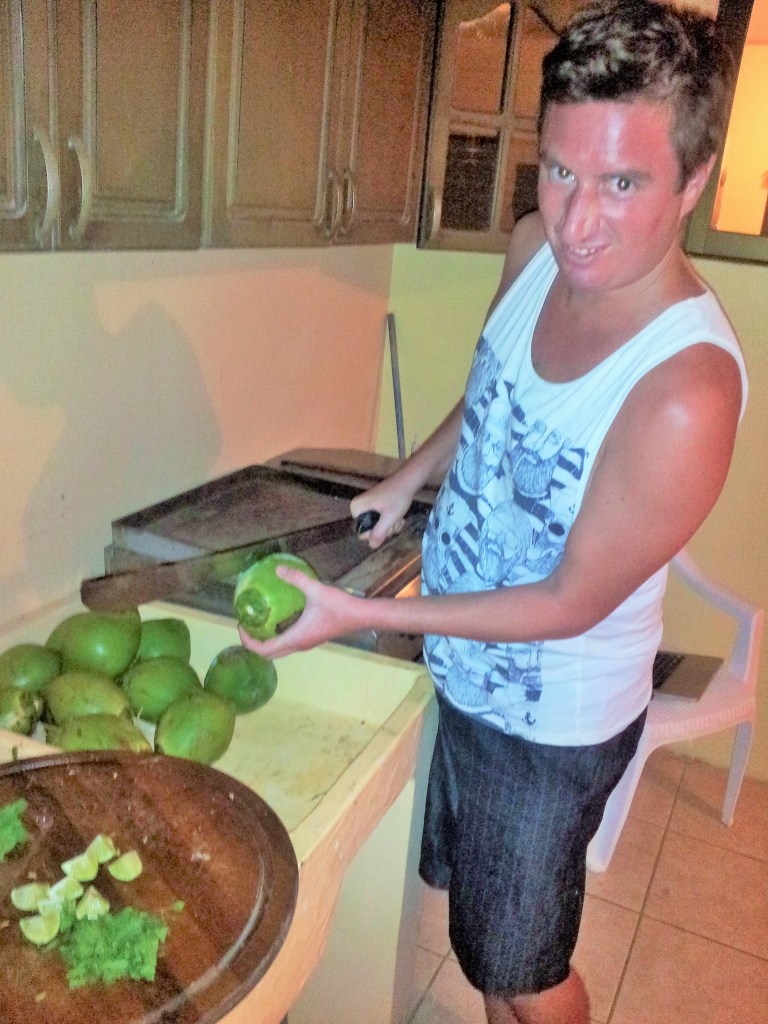 Regan hacking up some cocos for locos