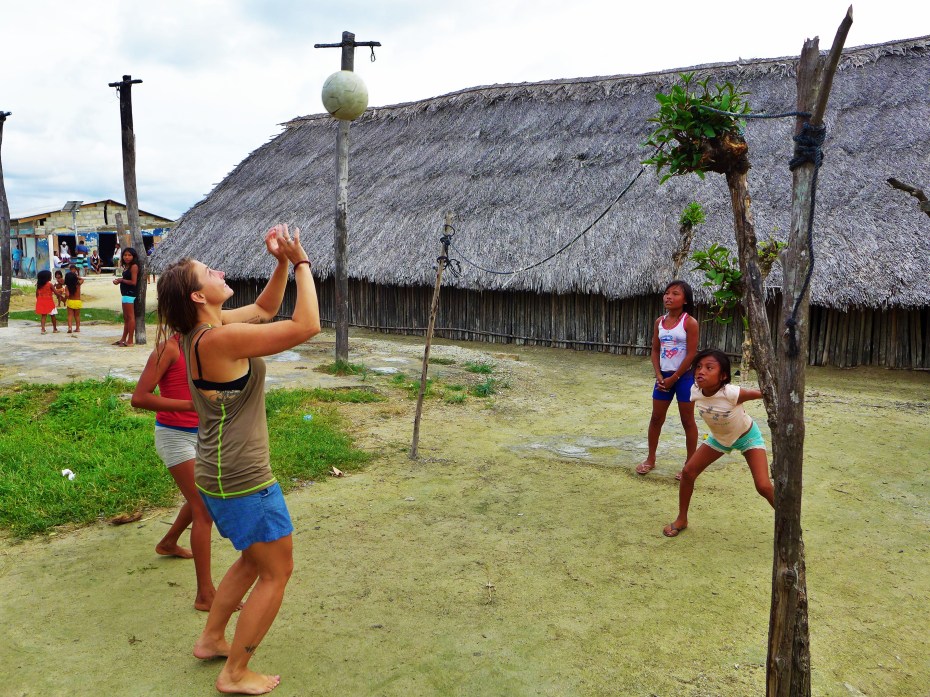 Jenn stopping to play a little V-ball with the girls