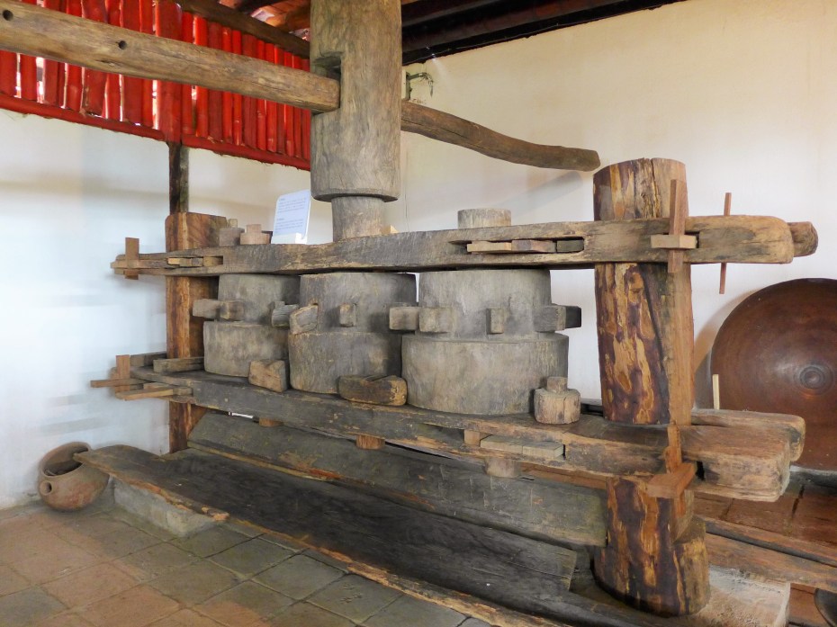 horse/oax turned machine that would grind sugarcane 