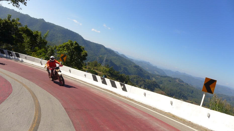 curve after curve await on the Mae Hong Son loop.. The really tight ones are marked by red pavement. 