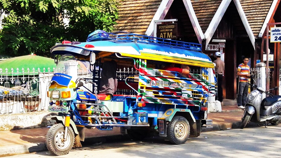 not sure why we are walking with all these cool moto taxi around