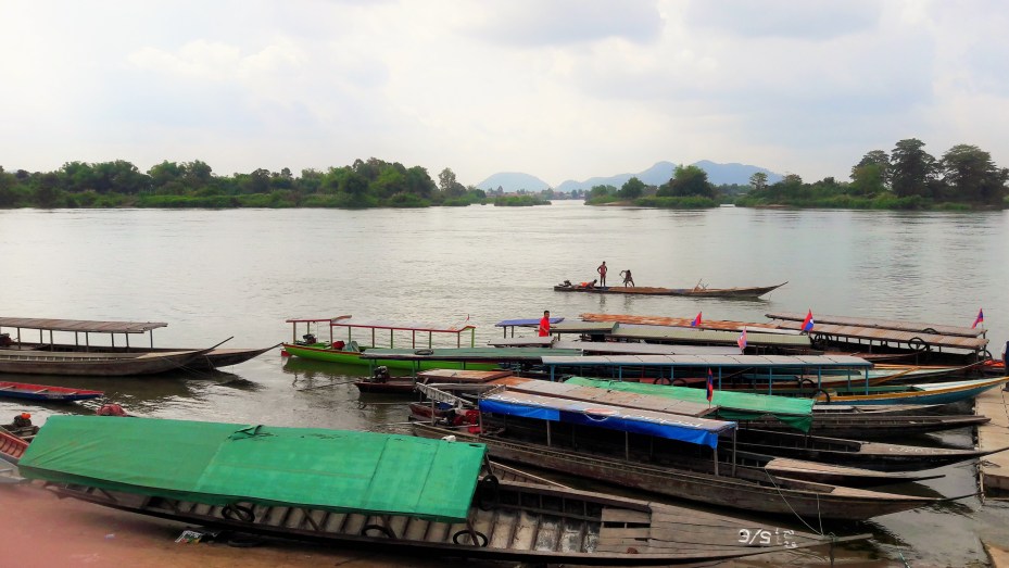 The barely sea worthy boats stood ready to transport travellers down river