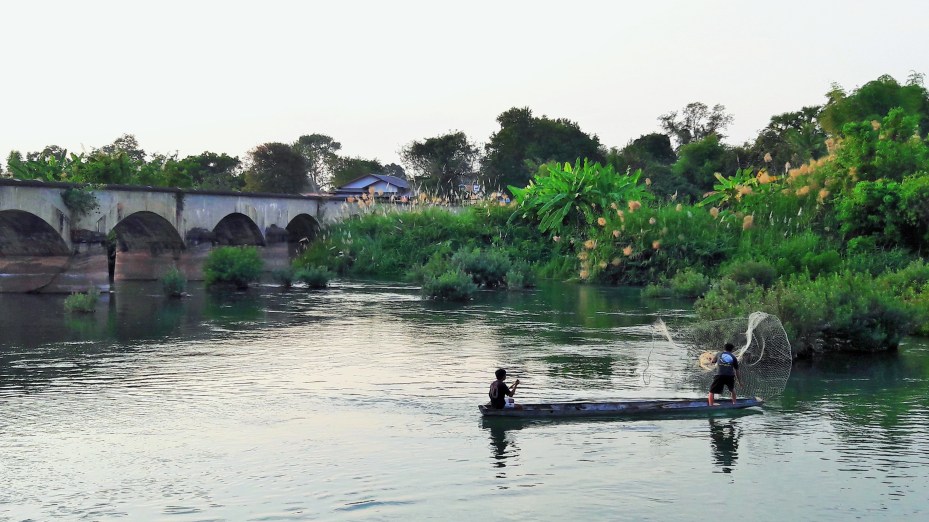 net fisherman at dusk