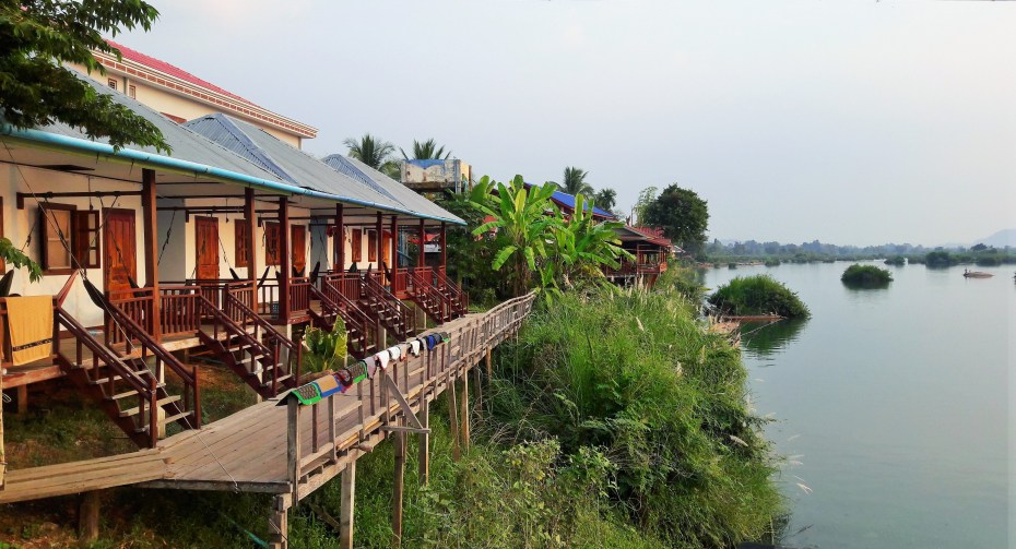 sunset side bungalows line the rivers banks