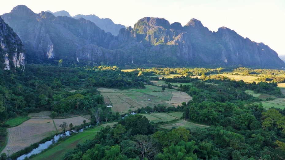 The dry rice fields below